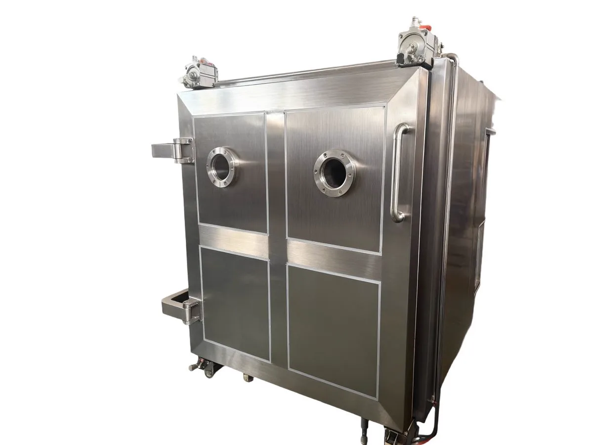 Industrial QS freeze dryer with square stainless steel chamber standing at the center of a snack production line