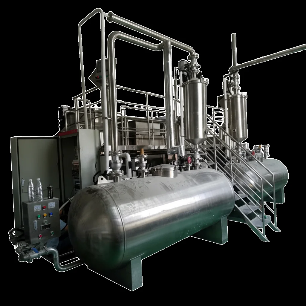 Vacuum fryer system with horizontal oil management tank in the factory